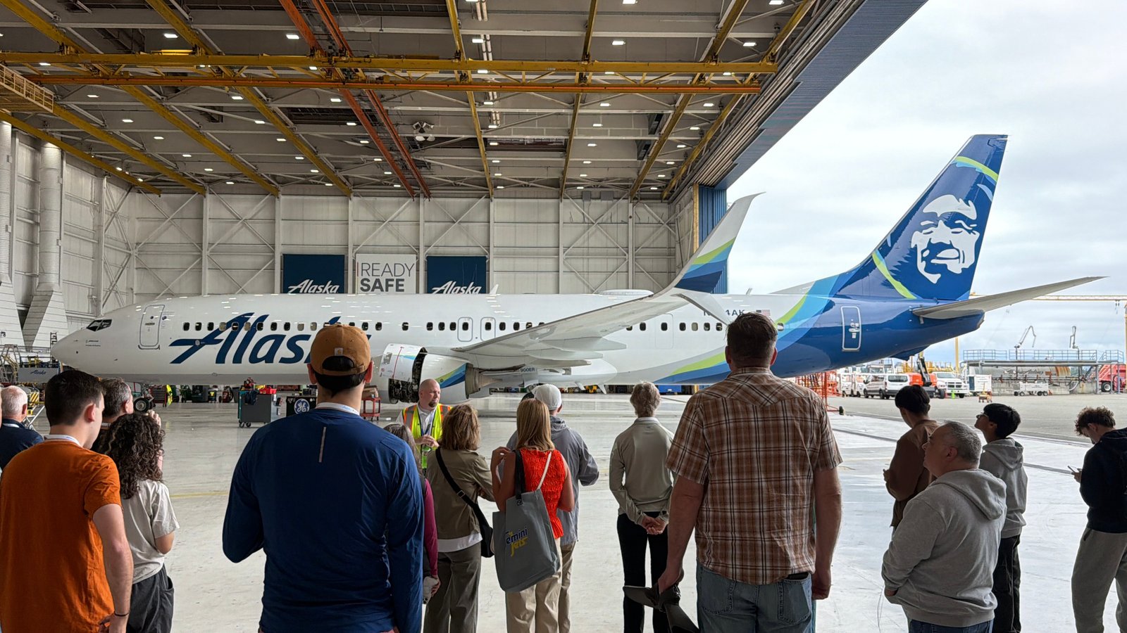 Aviation Expo attendees touring an Alaska Airlines facility