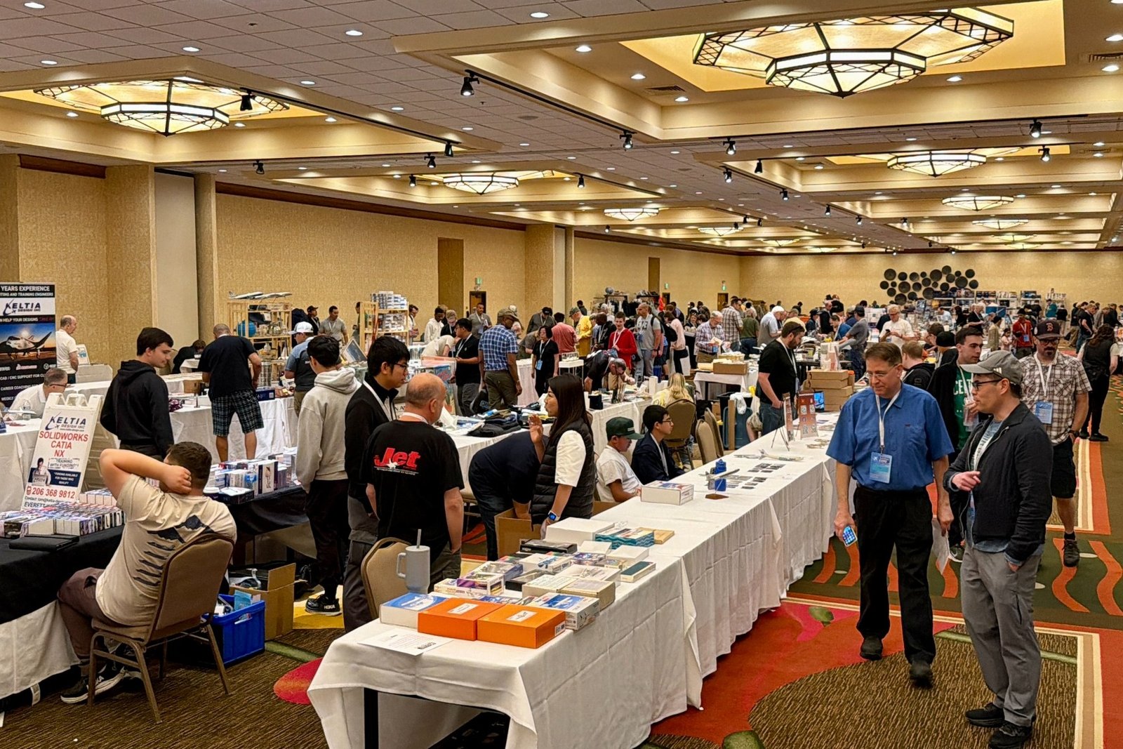 Full Aviation Expo ballroom marketplace filled with vendors and attendees